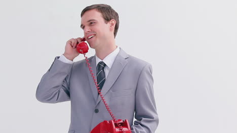 Cheerful-businessman-talking-on-the-phone