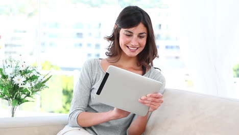 Young-Adult-using-her-Tablet