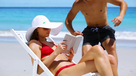 Smiling-woman-reading-a-book