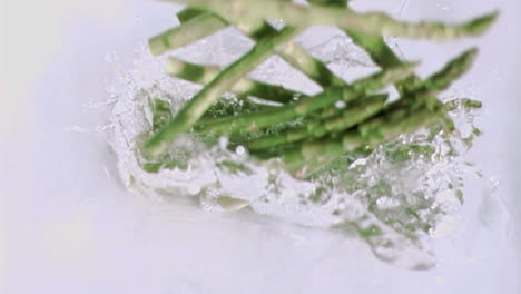 Asparagus-falling-into-water-in-super-slow-motion