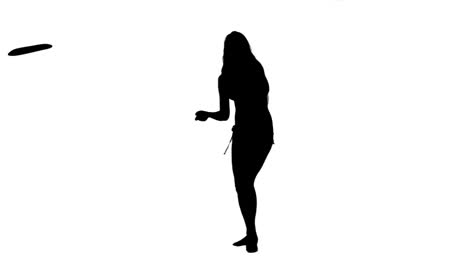 Silhouette-of-a-woman-throwing-a-frisbee