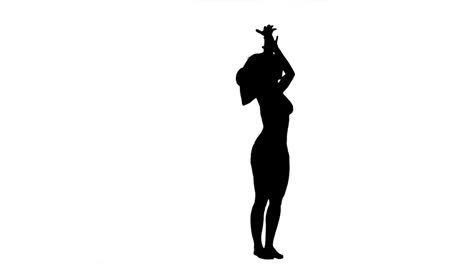 Silhouette-Einer-Frau-Mit-Hut-In-Zeitlupe