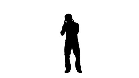 Silhouette-of-a-dancing-man-listening-to-music
