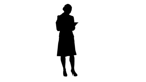 Silhouette-woman-holding-tablet-computer