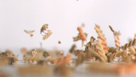 Fusilli-falling-down-in-super-slow-motion