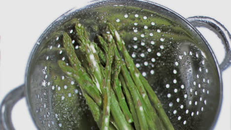 Asparagus-in-sieve-in-super-slow-motion