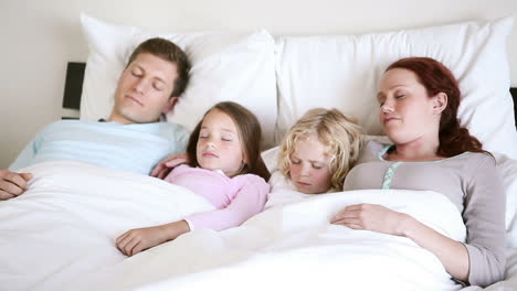 Family-sleeping-together