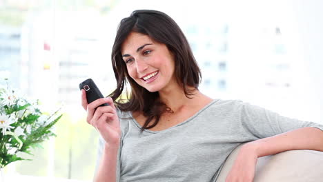 Woman-receives-and-reads-a-text