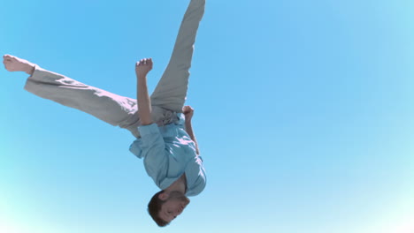 Man-jumping-in-slow-motion-on-a-trampoline