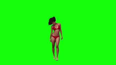 A-woman-wearing-a-red-bikini-is-dancing