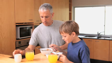 Smiling-father-holding-bowls