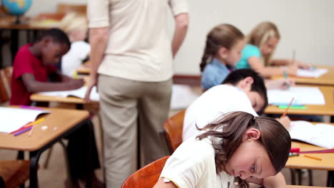 Teacher-watching-her-pupils