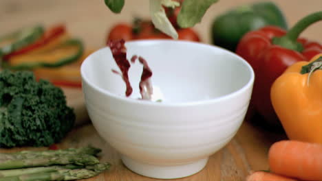 Lettuce-falling-into-bowl-in-super-slow-motion