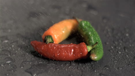 Water-sprayed-on-chilies-in-super-slow-motion