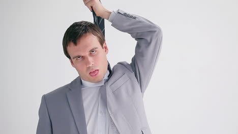 Frustrated-businessman-making-a-hanging-gesture