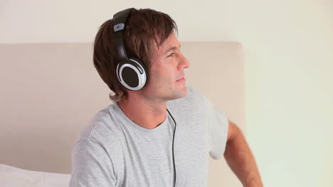 Man-using-headphones