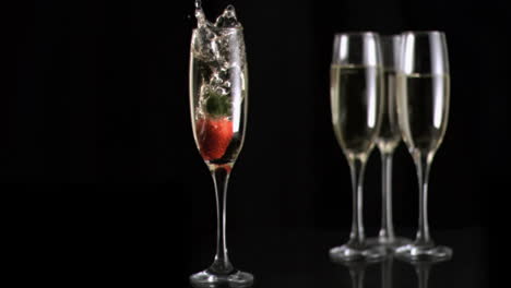 Strawberry-diving-in-super-slow-motion-into-white-wine