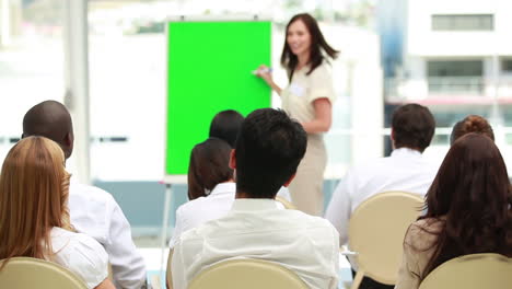 Businesswoman-showing-a-board