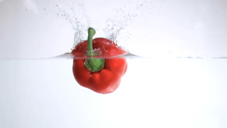 Pepper-falling-into-water-in-super-slow-motion