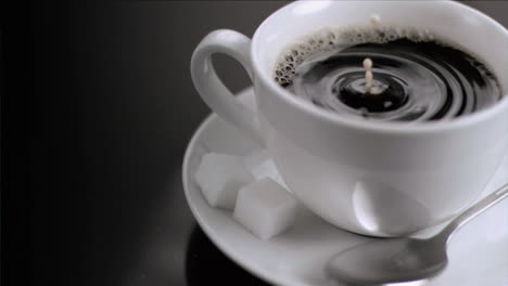 Drop-of-milk-falling-in-super-slow-motion-in-coffee
