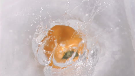 Pepper-falling-into-water-in-super-slow-motion