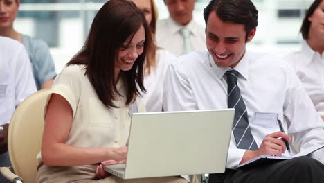 Colleagues-using-a-laptop-at-a-meeting