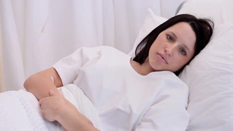 Sick-woman-on-her-bed