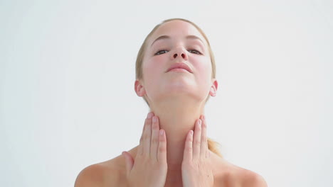 Peaceful-woman-massaging-her-neck