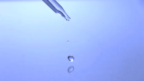 Drop-falling-off-pipette-in-super-slow-motion