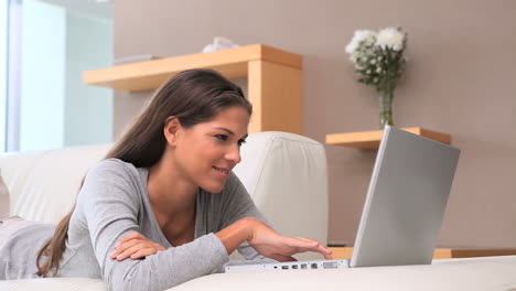 Relaxed-woman-using-her-laptop