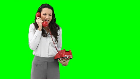 A-woman-on-the-phone-talking-aggressively-