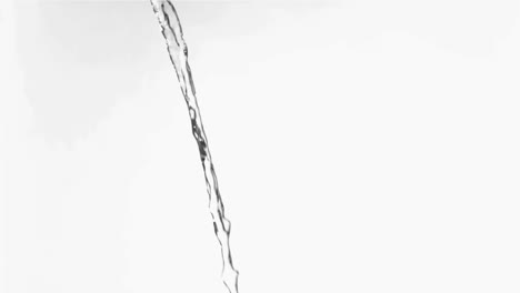 Transparent-liquid-in-a-super-slow-motion-flowing-continuously-