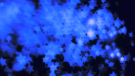 Blue-stars-floating-in-super-slow-motion-in-the-air