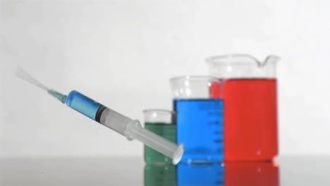 Syringe-in-a-super-slow-motion-falling-