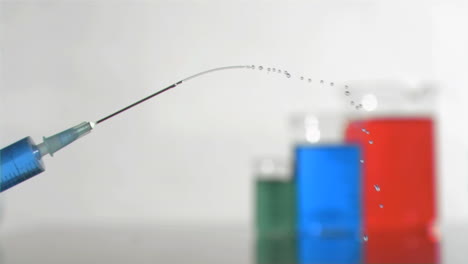 Syringe-droplets-in-super-slow-motion-falling-in-the-air-