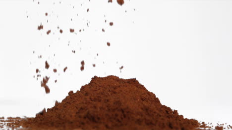 Coffee-powder-falling-in-super-slow-motion-