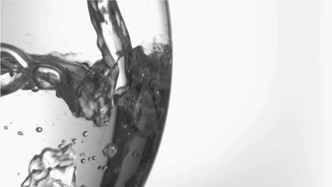 Trickle-of-water-in-super-slow-motion-filling-a-glass