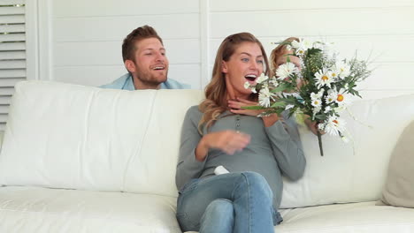 Father-and-son-surprises-the-mother-with-flowers