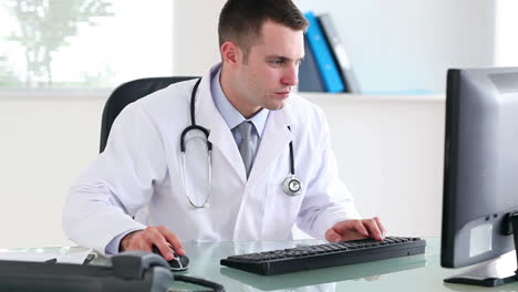 Doctor-typing-on-a-keyboard-