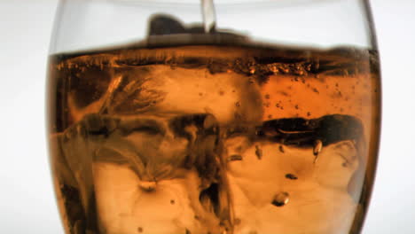 Liquid-in-super-slow-motion-being-poured-in-a-glass