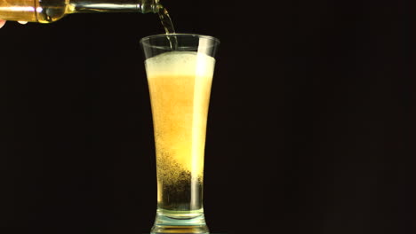 Bottle-filling-a-glass-of-beer