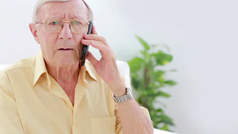 Senior-calling-with-mobile-phone