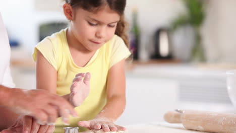 Granny-and-child-preparing-a-pasta-