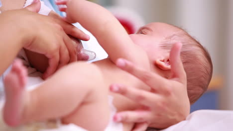Mother-breastfeeding-a-new-born-baby