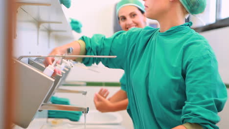 Nurse-washing-hands-while-smiling