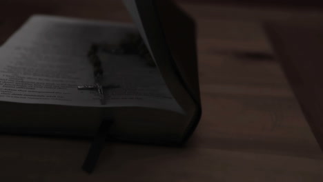 Bible-opening-with-crucifix-on-page