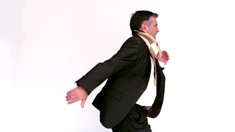 Side-view-of-businessman-running-