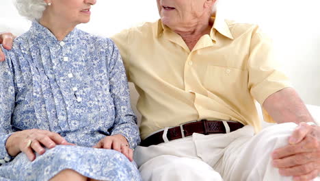 Two-old-people-talking-quietly