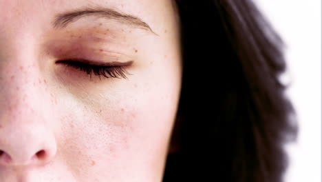 Woman-opening-her-eye-in-slow-motion-with-colours-turning-inside