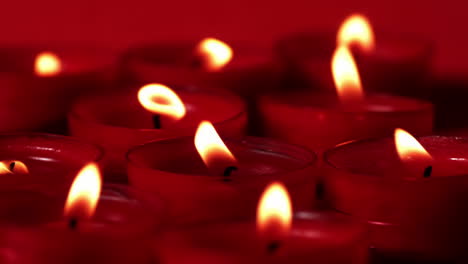 Red-candles-flickering-in-the-breeze